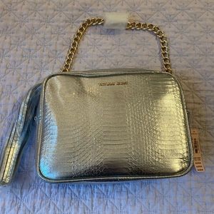 NWT Victoria’s Secret silver croc handbag tasseled zipper pull and gold chain.